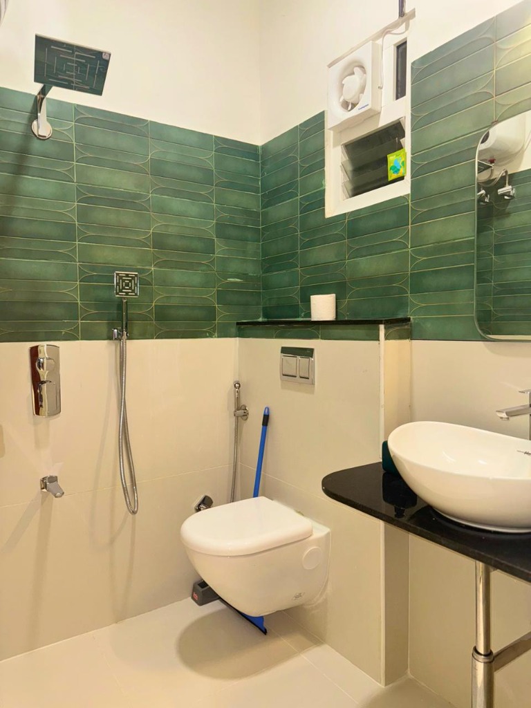Luxury Washroom with Green Tiles
